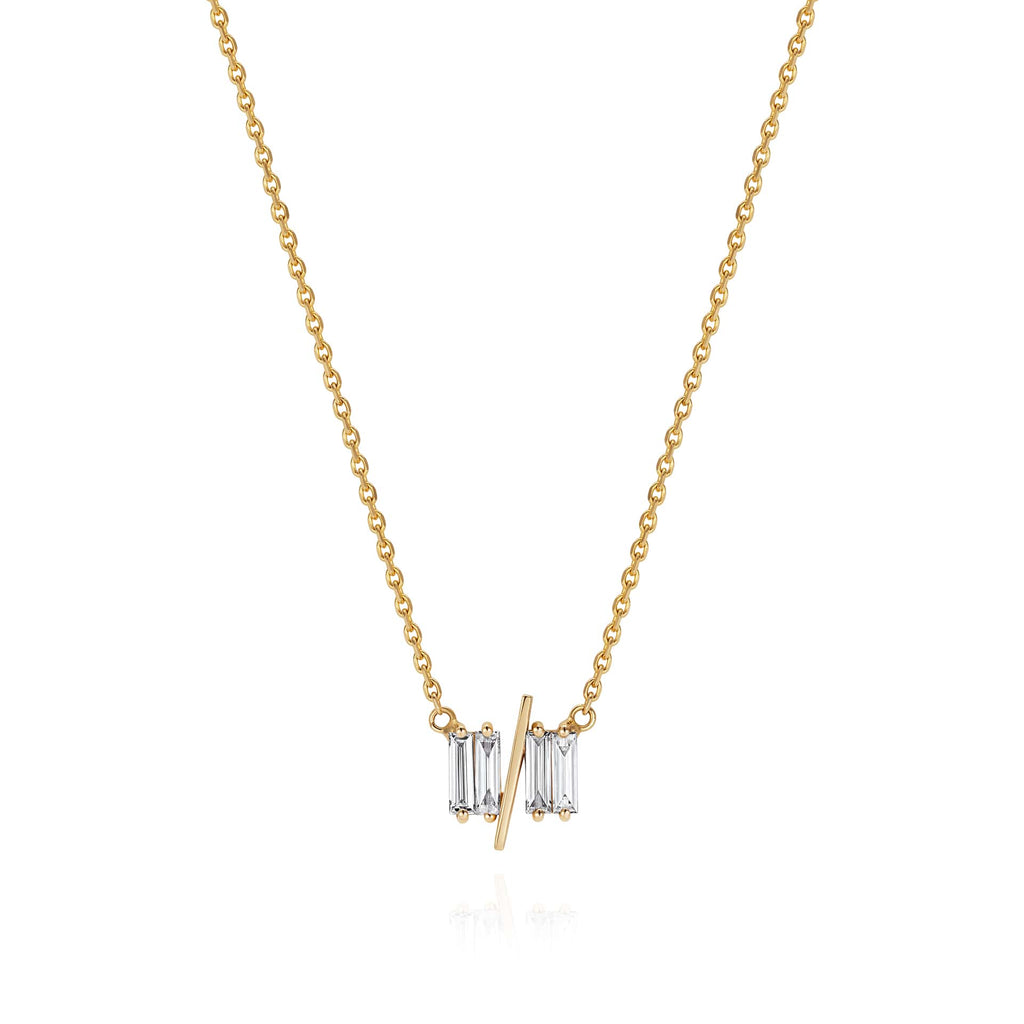 11/11 necklace in yellow gold – featuring a thin yellow gold chain, 4 long thin diamonds, with a thin diagonal gold bar, to look like the ‘11/11’ symbol.