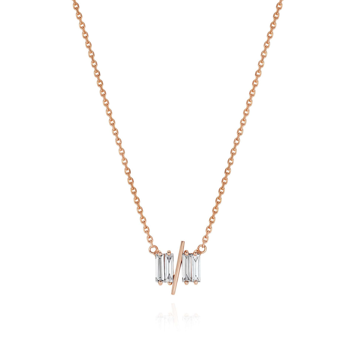 11/11 necklace in rose gold - featuring a thin rose gold chain, 4 long thin diamonds, with a thin diagonal gold bar, to make the ‘11/11’ symbol.