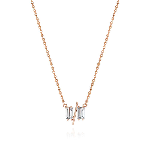 11/11 necklace in rose gold - featuring a thin rose gold chain, 4 long thin diamonds, with a thin diagonal gold bar, to make the ‘11/11’ symbol.