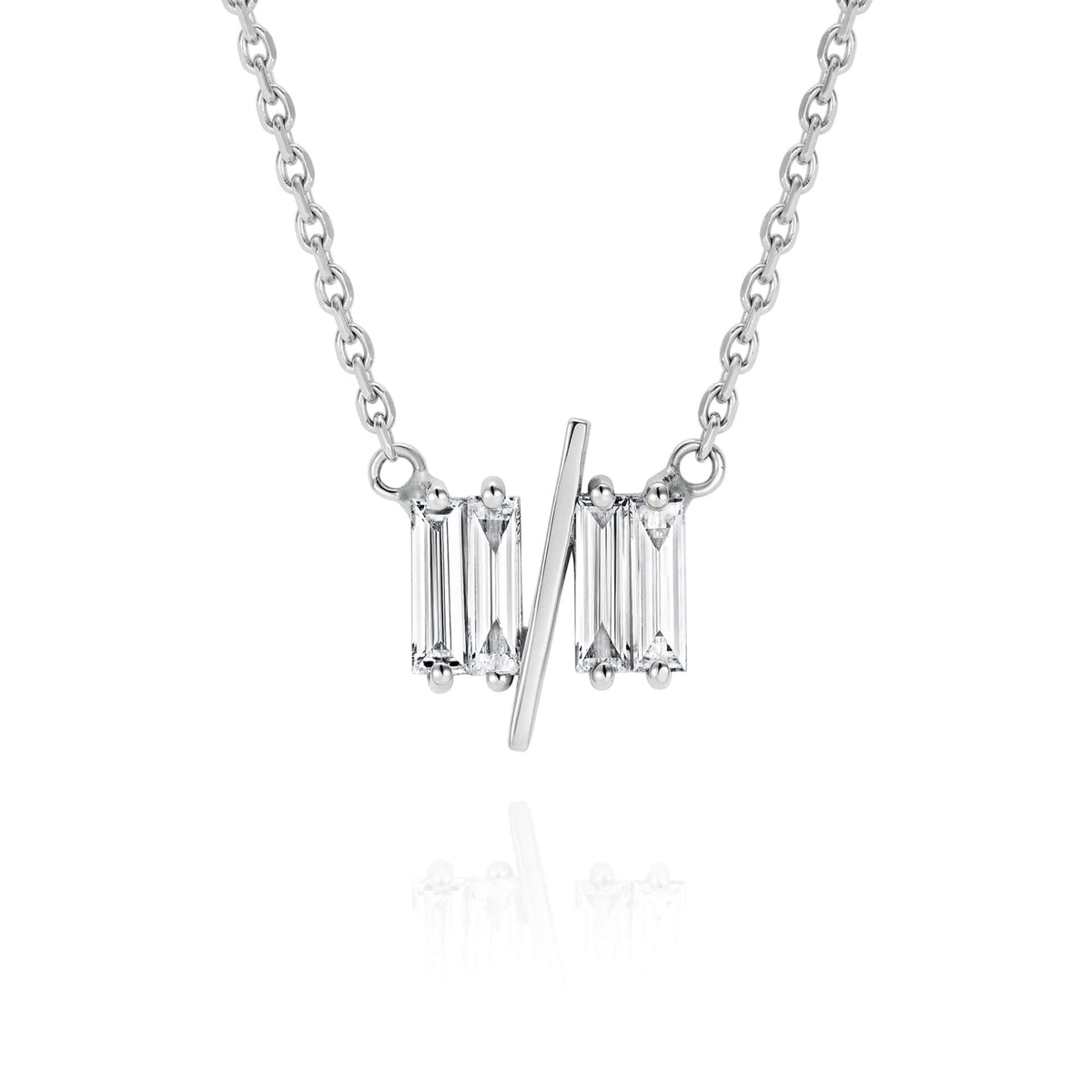 Close up of 11/11 necklace in white gold - featuring a thin white gold chain, 4 long thin diamonds, with a thin diagonal gold bar, to make the ‘11/11’ symbol.