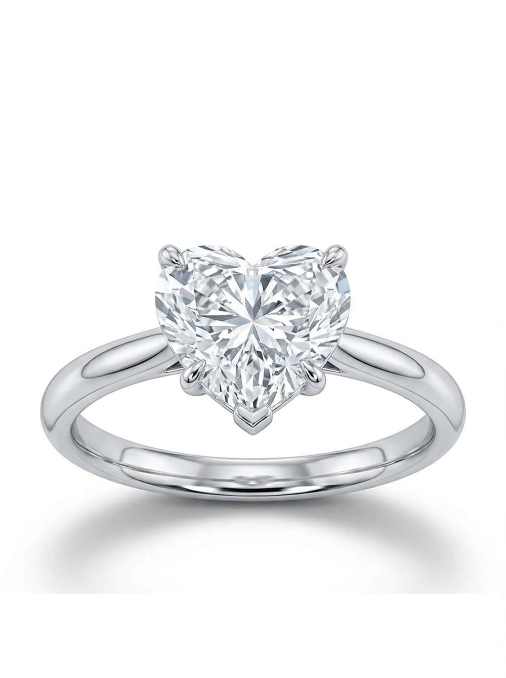 Heart-shaped diamond ring on a white background