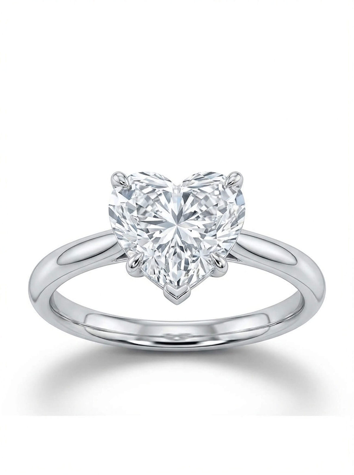 Heart-shaped diamond ring on a white background