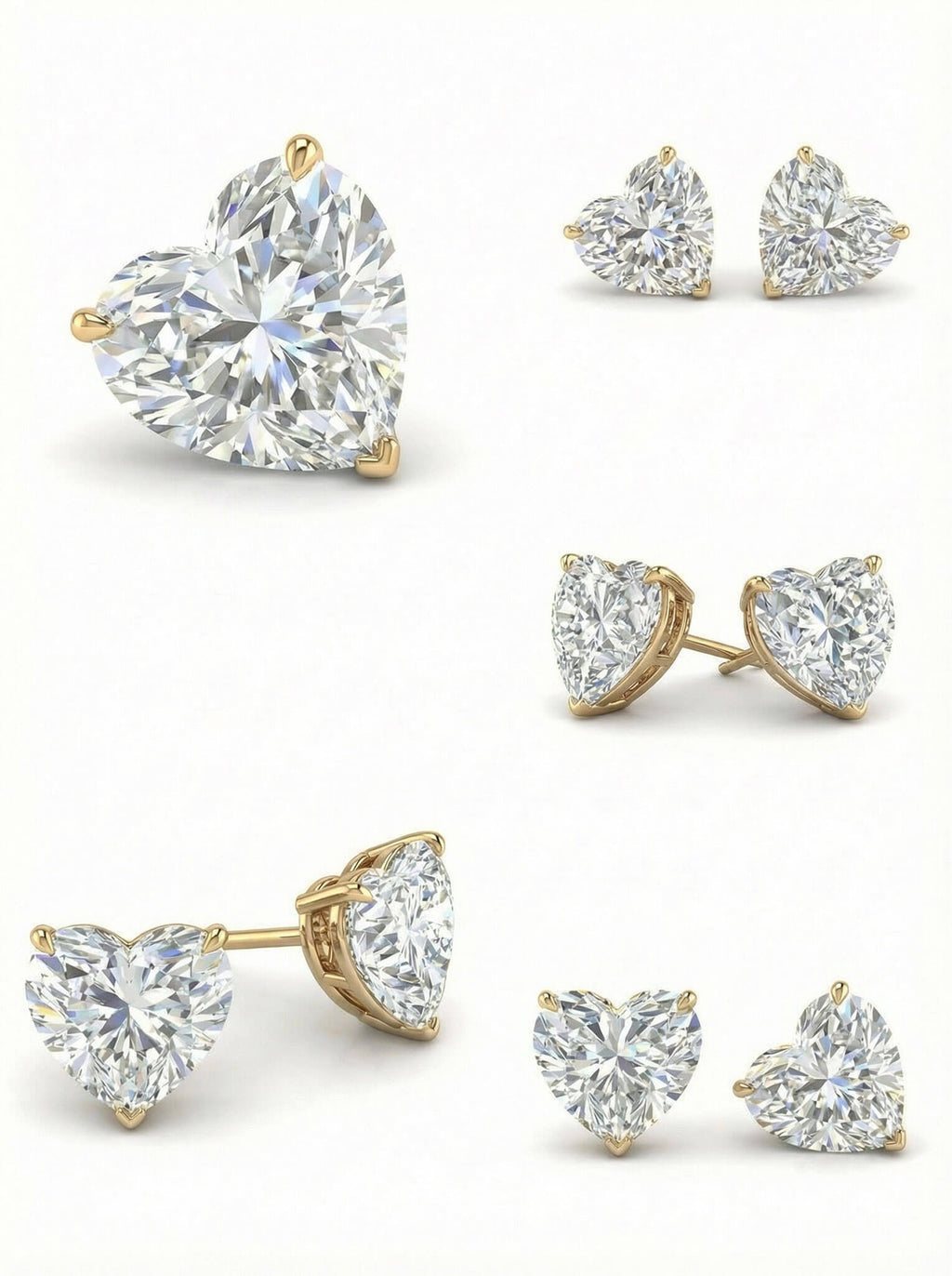 Heart-shaped diamond earrings with gold settings on a white background