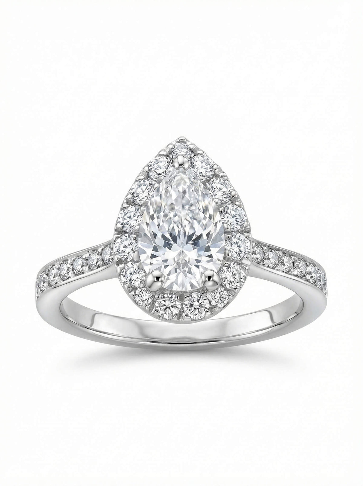 Diamond ring with pear-shaped center stone on a white background
