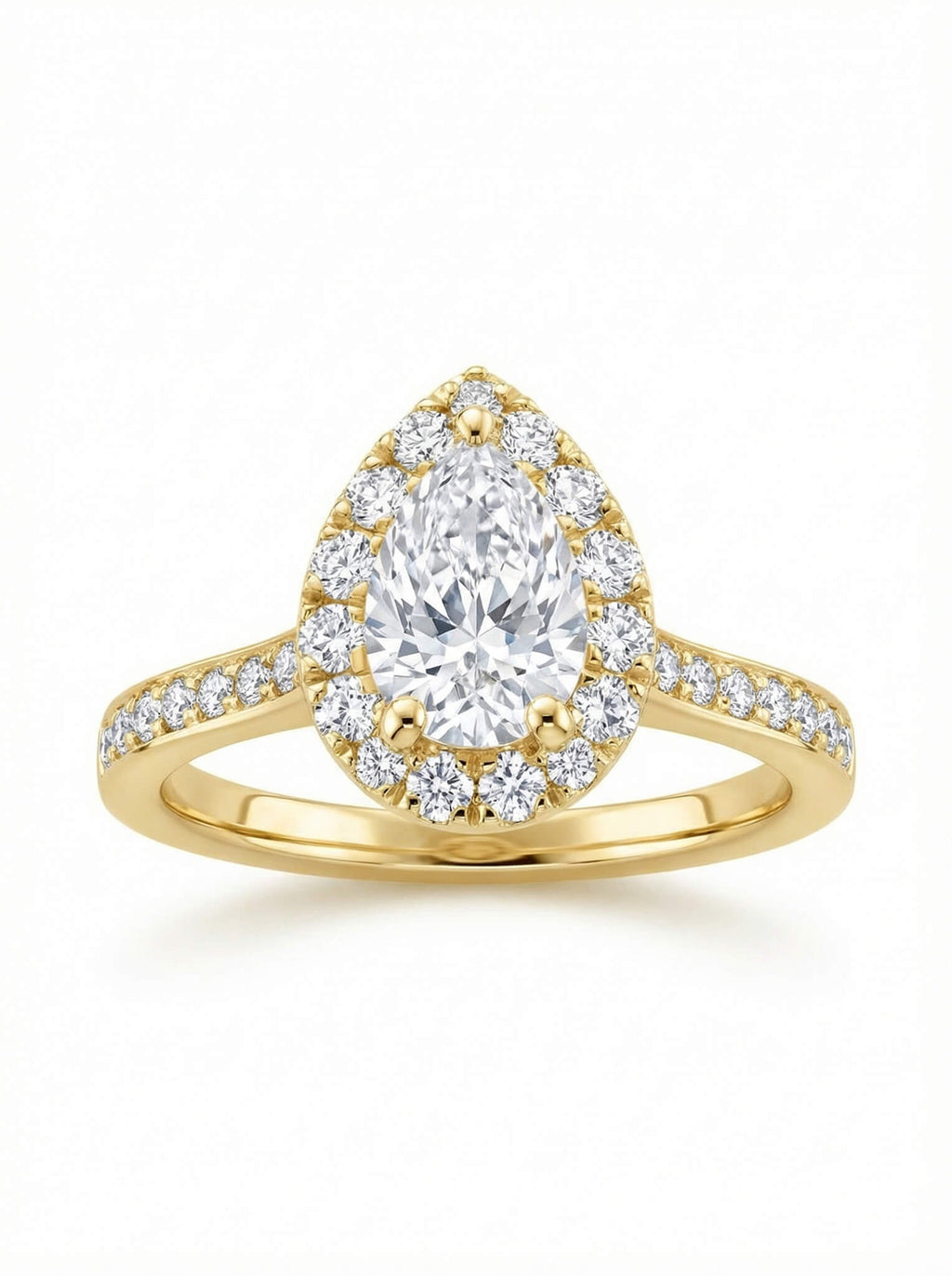 Gold ring with a pear-shaped diamond surrounded by smaller diamonds on a white background.